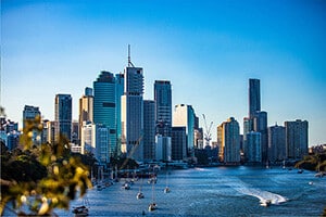 Property market news with Brisbane river and city in the background