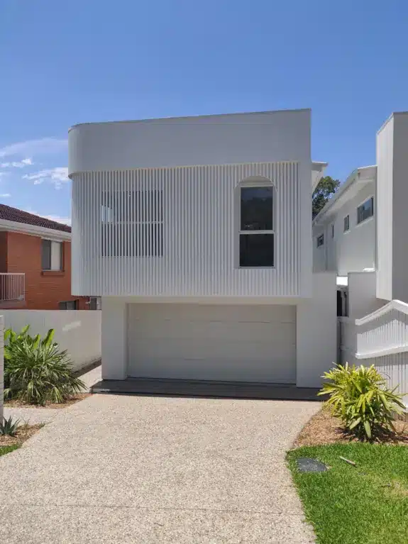 Buyers agent for property developers Brisbane A white modern newly home built by property developers Brisbane.