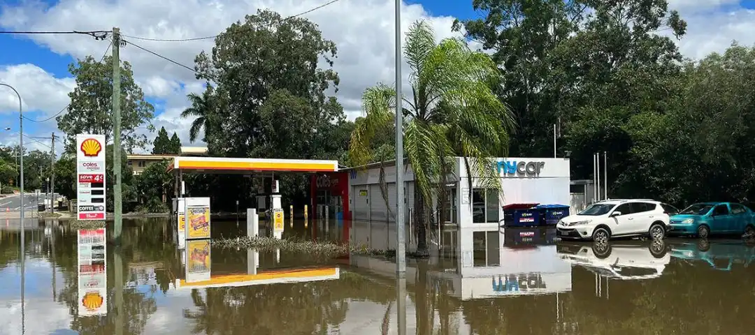 Brisbane flooding Petrol station flooding. What to look out for when buying property in Bribane