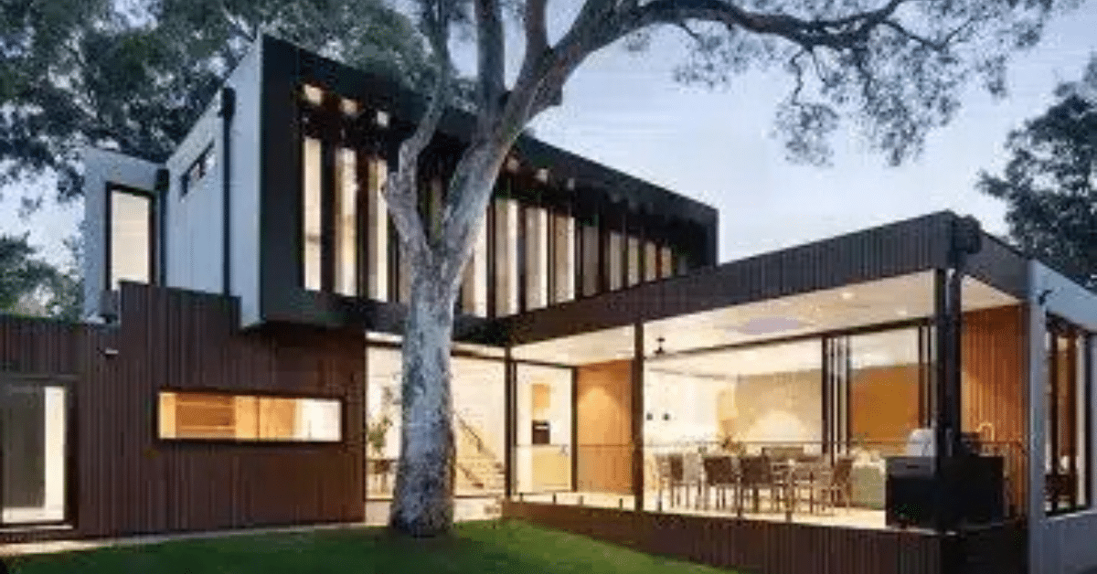 Happy couple reviewing property options with a Brisbane buyers agent helping them find their dream home.