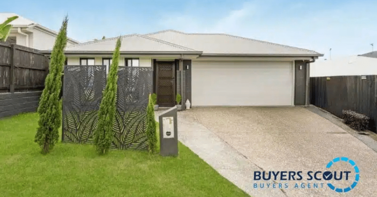 Homebuyer consulting with a professional Brisbane buyers agent